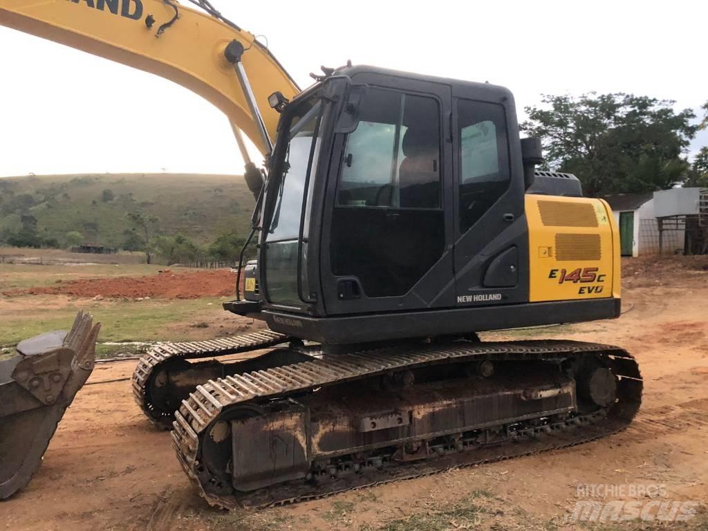 New Holland E 145 Pelle sur chenilles