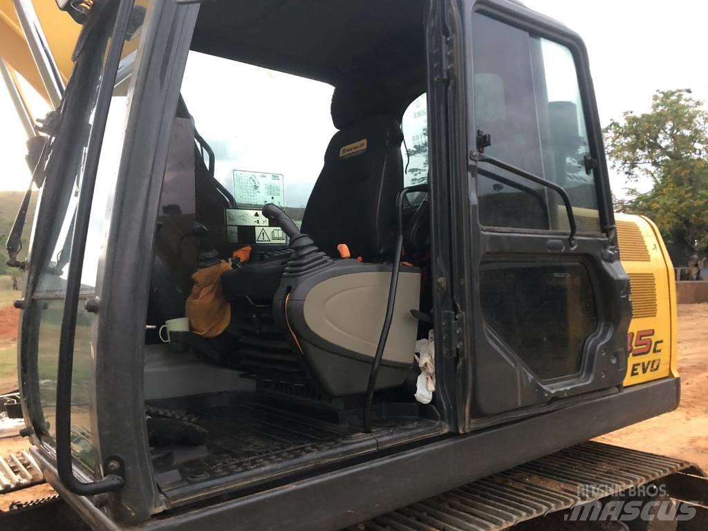 New Holland E 145 Pelle sur chenilles