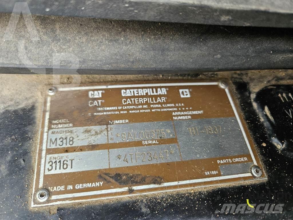 CAT M 318 C Pelle sur pneus