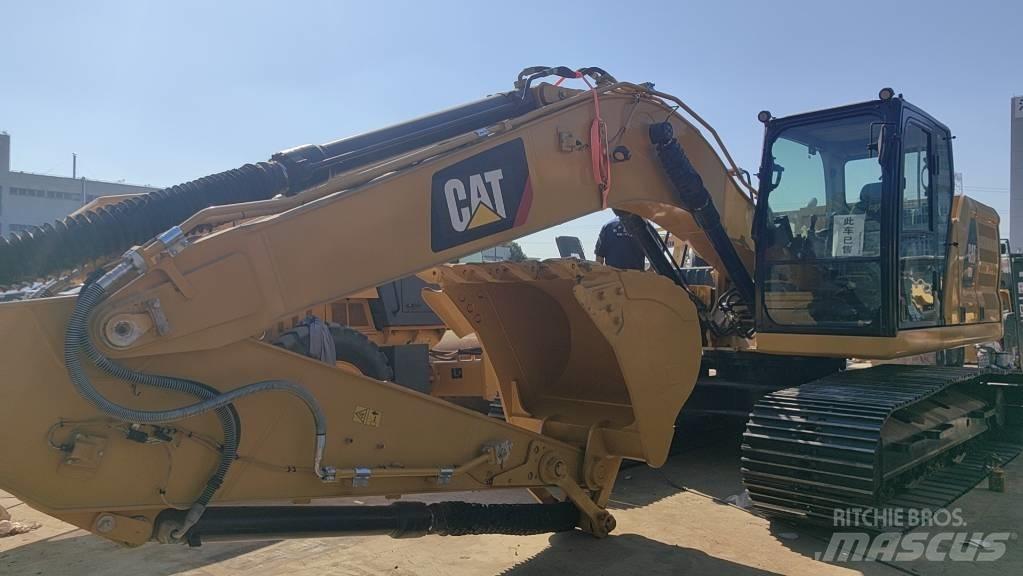 CAT 2018 CAT 320 Pelle sur pneus