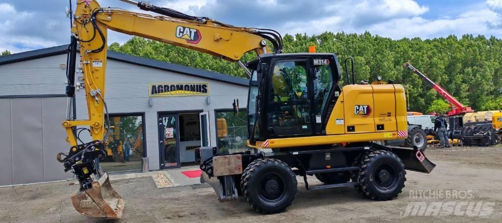 CAT 314 Pelle sur pneus