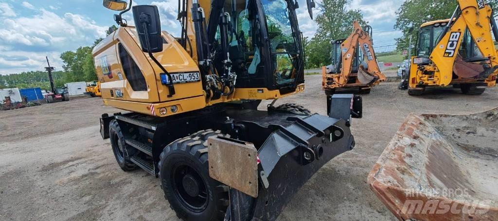 CAT 314 Pelle sur pneus