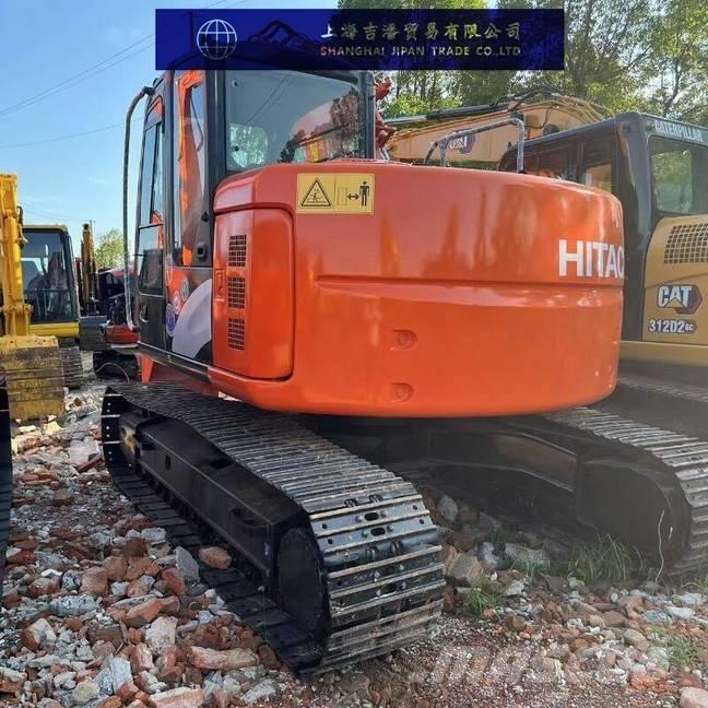 Hitachi ZX 135 Pelle sur chenilles