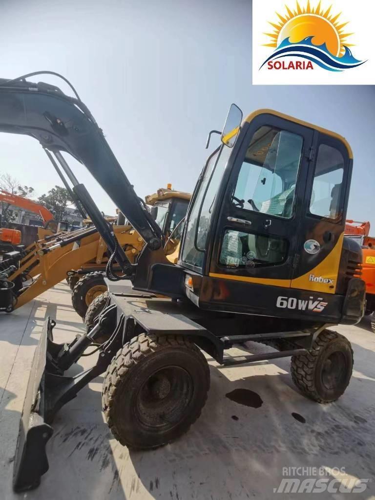 Hyundai R60W vs Mini pelle < 7t