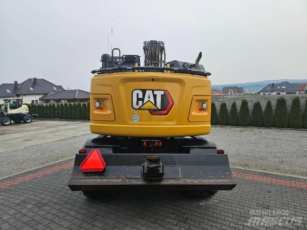 CAT M 315 F Pelle sur pneus