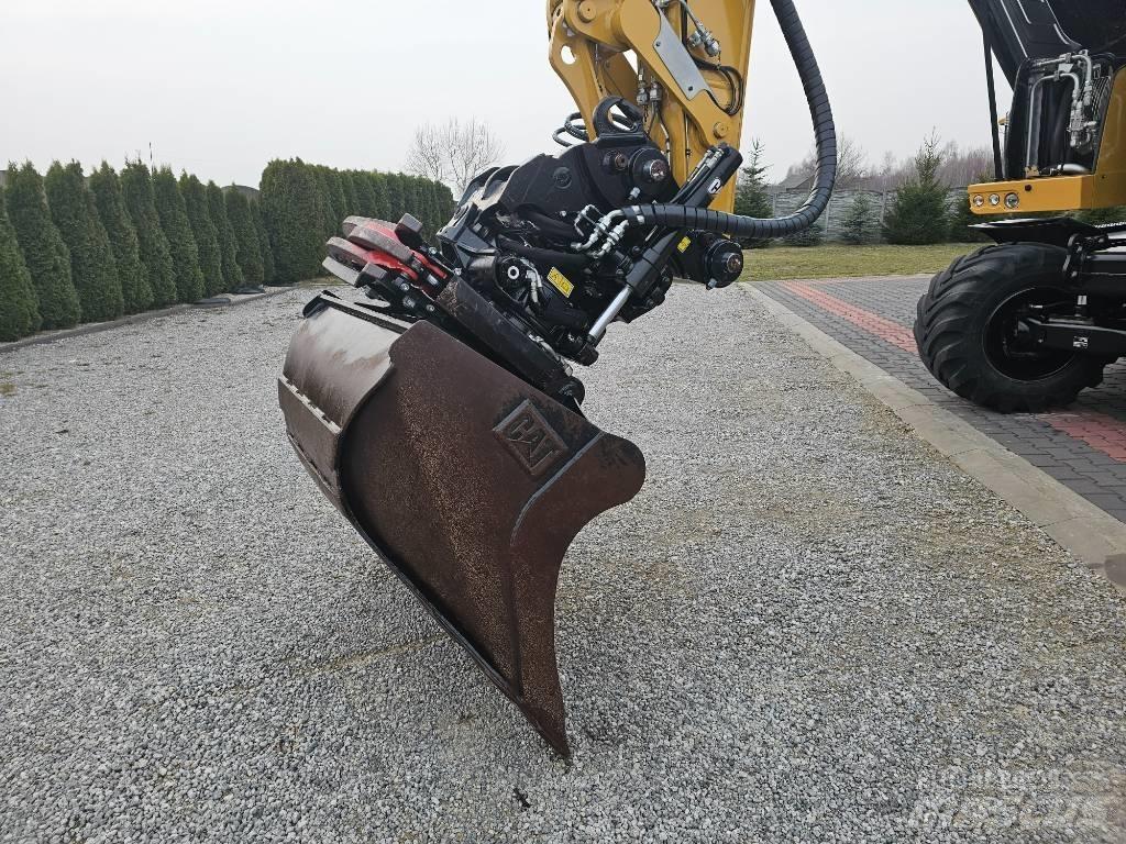 CAT M 315 F Pelle sur pneus