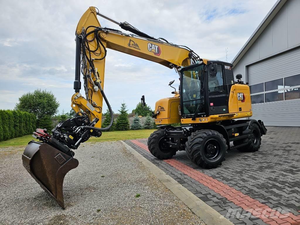 CAT M 315 F Pelle sur pneus