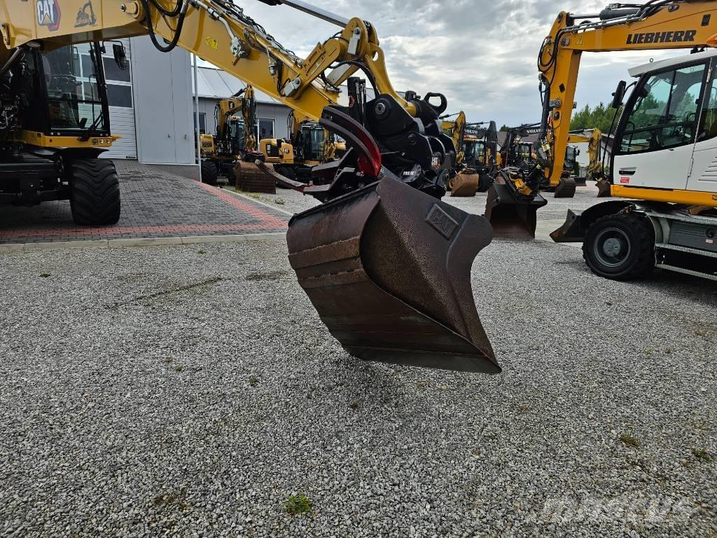 CAT M 315 F Pelle sur pneus