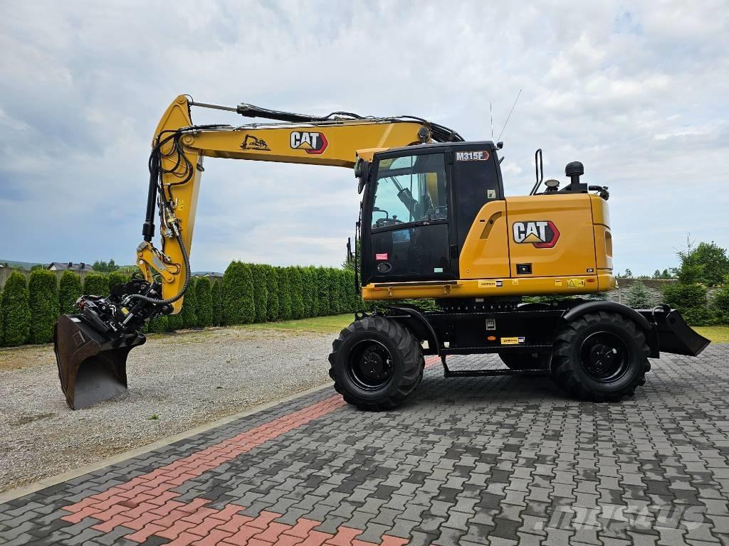 CAT M 315 F Pelle sur pneus