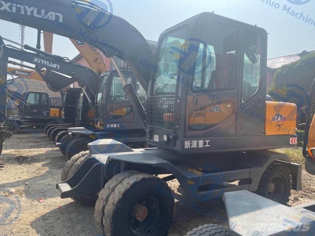 Xinyuan XYB75 Pelle sur pneus