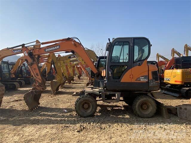 Doosan DX60W Mini pelle < 7t