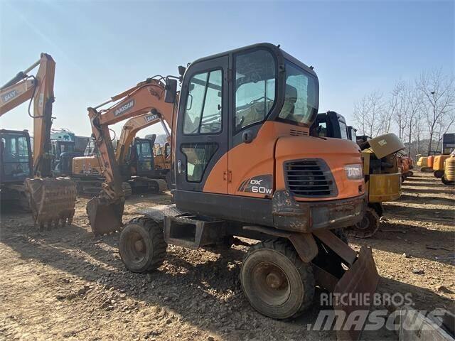 Doosan DX60W Mini pelle < 7t