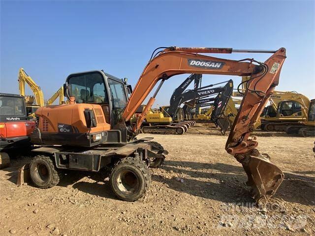 Doosan DX60W Mini pelle < 7t