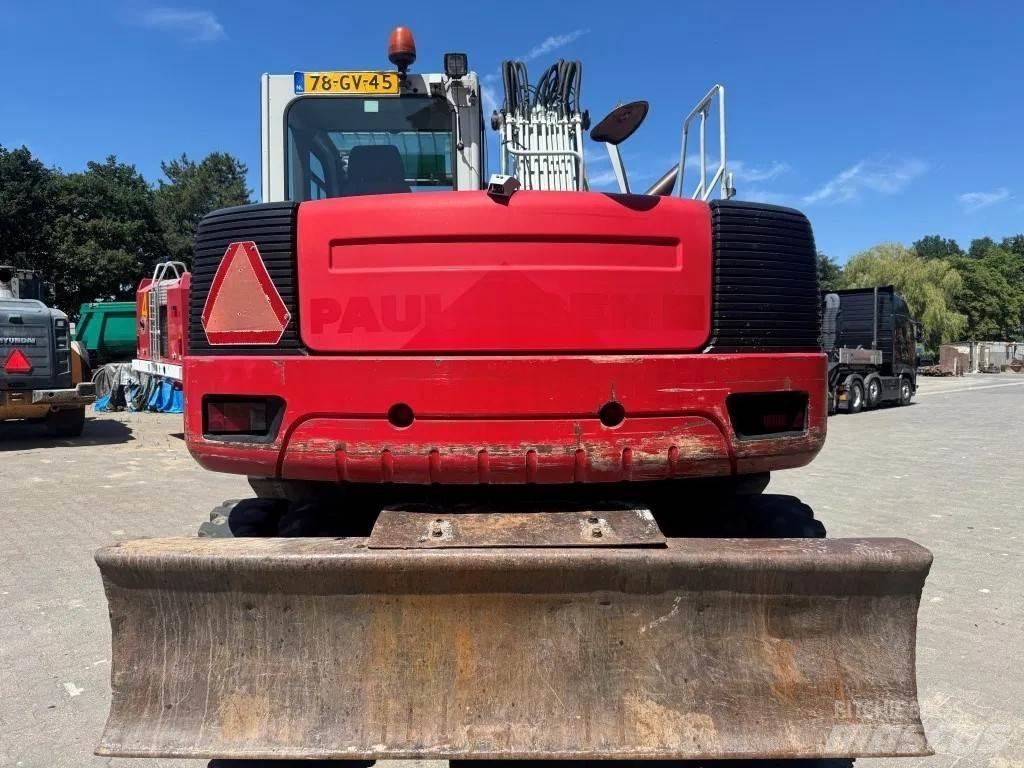 Takeuchi TB1160W Pelle sur pneus