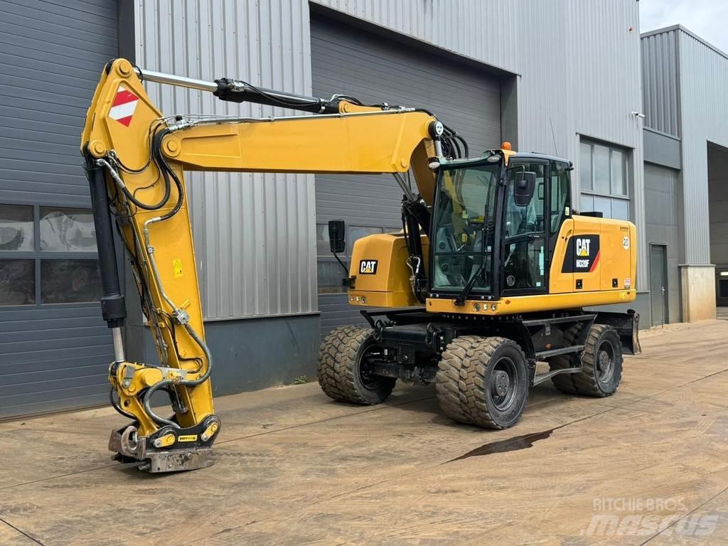 CAT M320F Pelle sur pneus