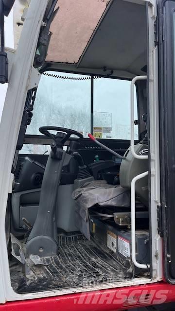 Takeuchi TB295W Pelle sur pneus