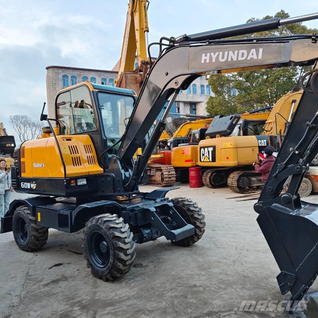 Hyundai 60 W VS Pelle sur pneus