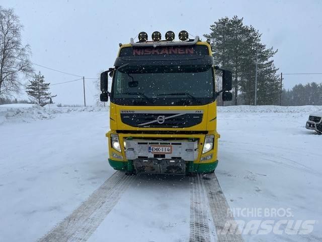 Volvo FM 13 8*4 Camion plateau ridelle avec grue