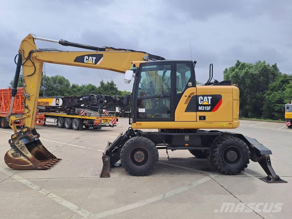 CAT M 315 F Pelle sur pneus