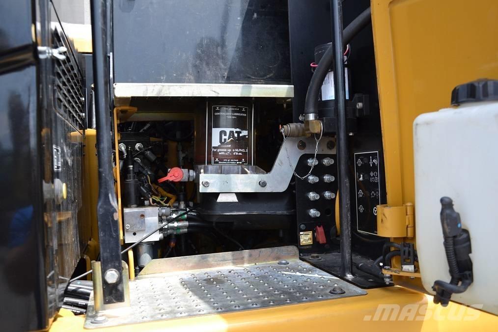 CAT M 315 D Pelle sur pneus