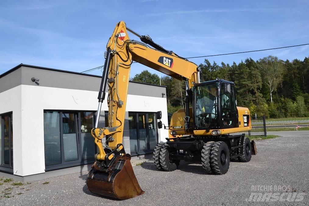 CAT M 315 D Pelle sur pneus