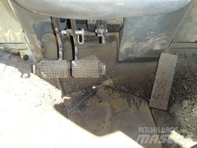 New Holland B 115 B Tractopelle