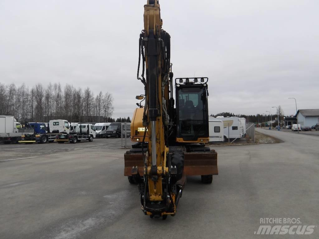 CAT M 318 Pelle sur pneus