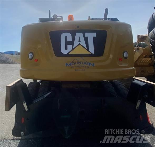 CAT M318F Pelle sur pneus