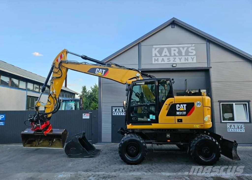 CAT M 317F Pelle sur chenilles