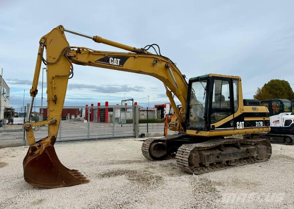 CAT 317 B LN Pelle sur chenilles