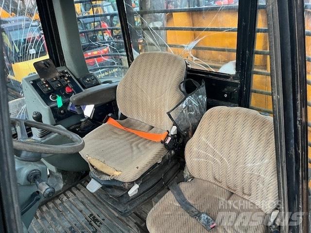 JCB 714 Tombereau articulé