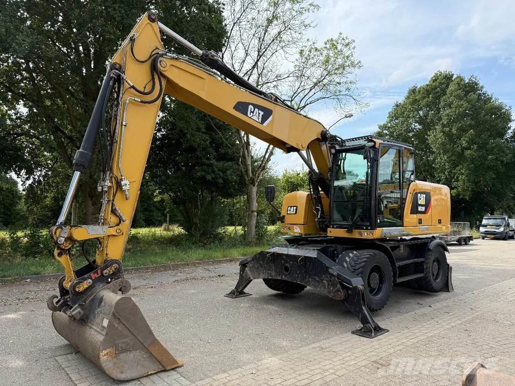 CAT M320F Pelle sur pneus