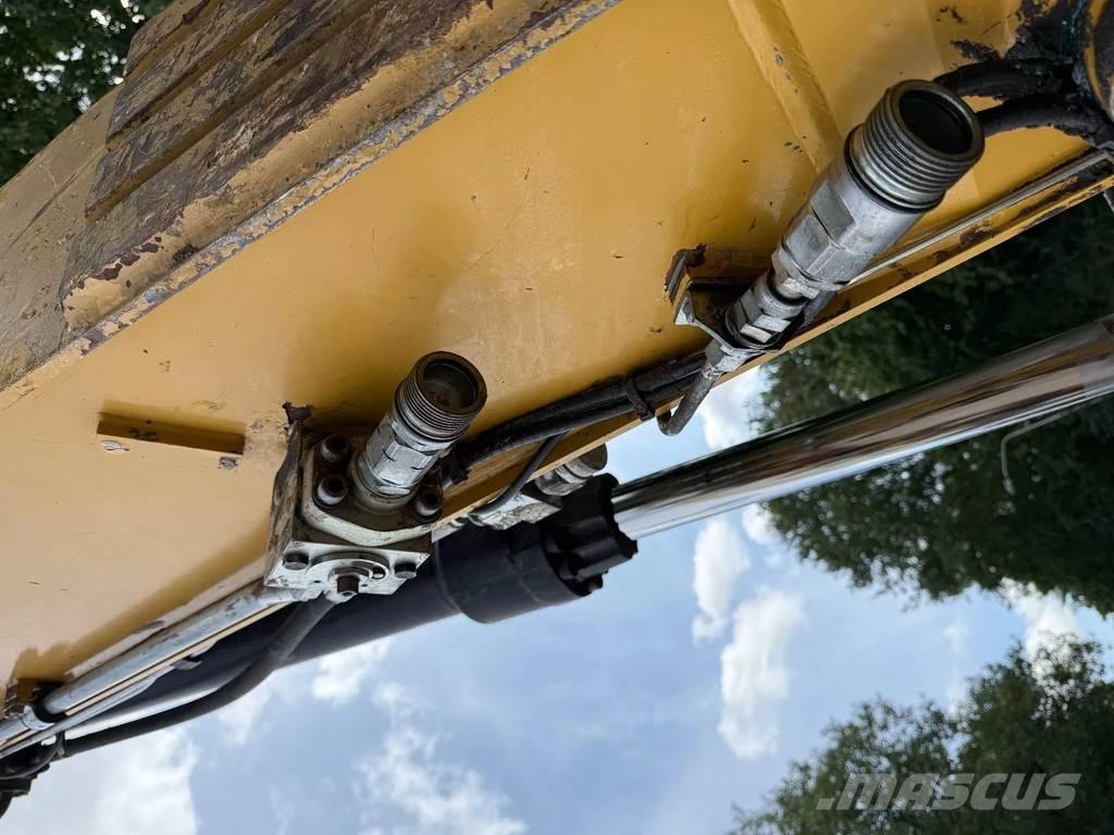 CAT M320F Pelle sur pneus