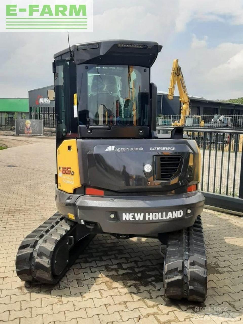 New Holland e65d Pelle sur pneus