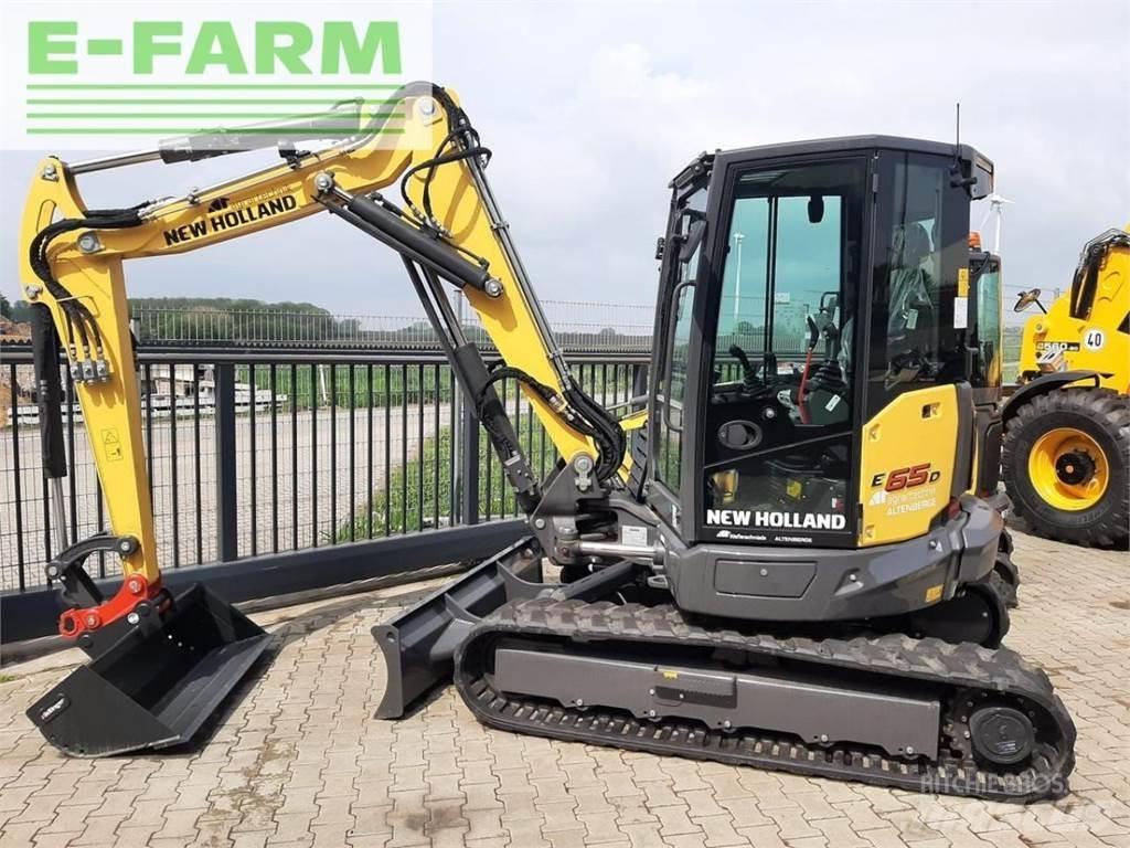 New Holland e65d Pelle sur pneus