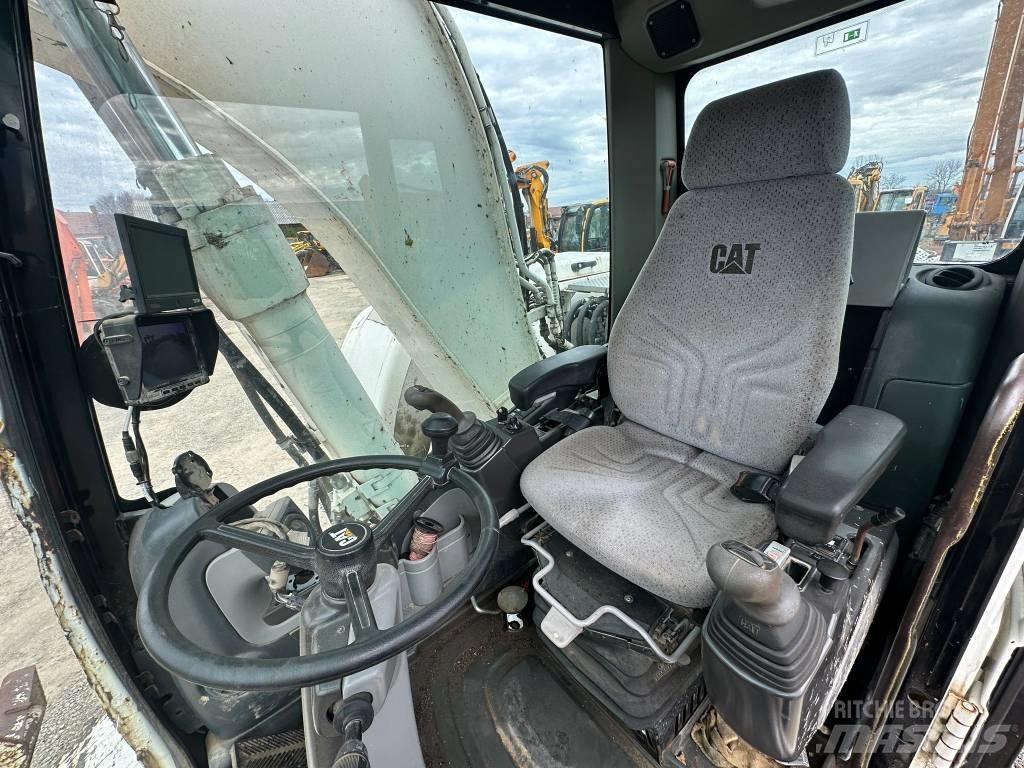 CAT M 316 D Pelle sur pneus