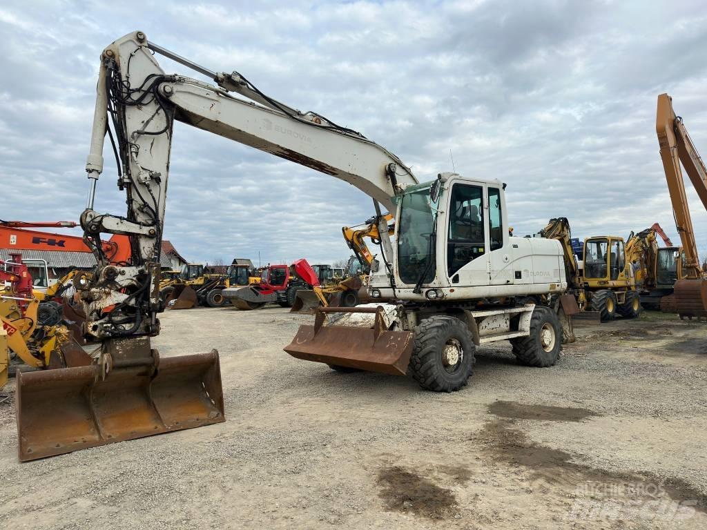 CAT M 316 D Pelle sur pneus