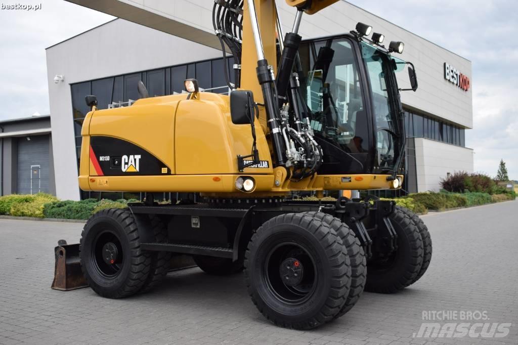 CAT M 313 D Pelle sur pneus