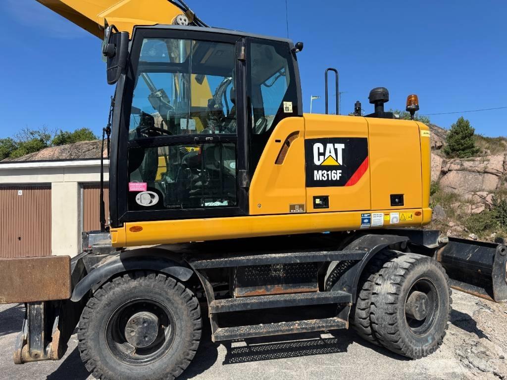 CAT M316F Pelle sur pneus