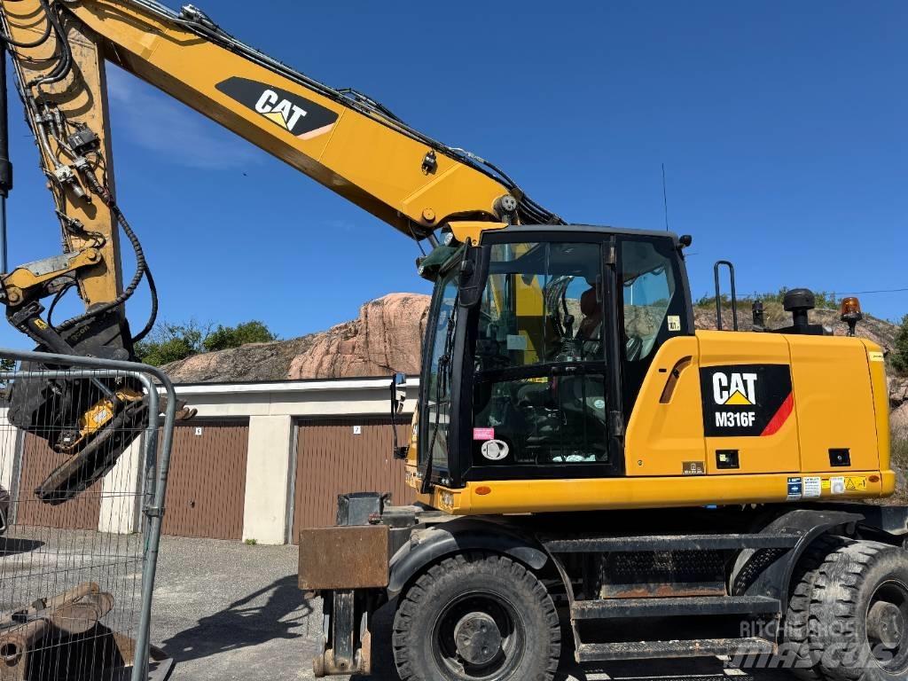 CAT M316F Pelle sur pneus