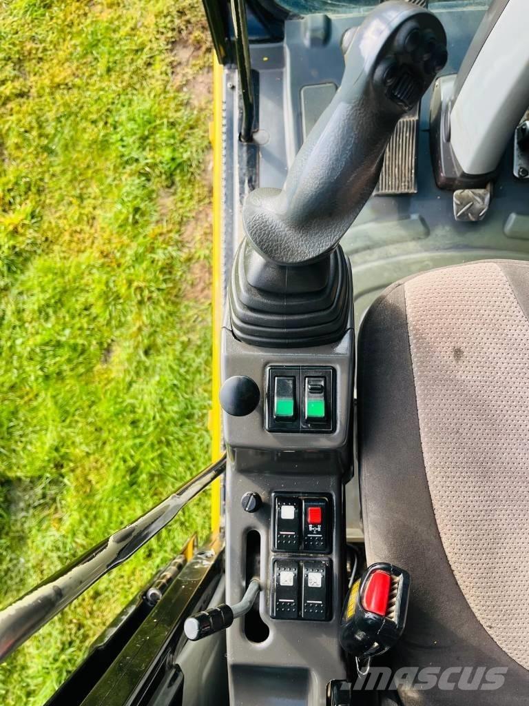 CAT M 315 D Pelle sur pneus
