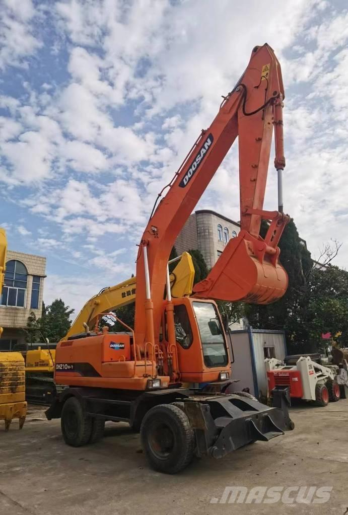 Doosan DH 210 W-7 Pelle sur pneus