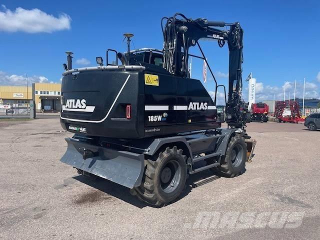 Atlas 185 W Pelle sur pneus