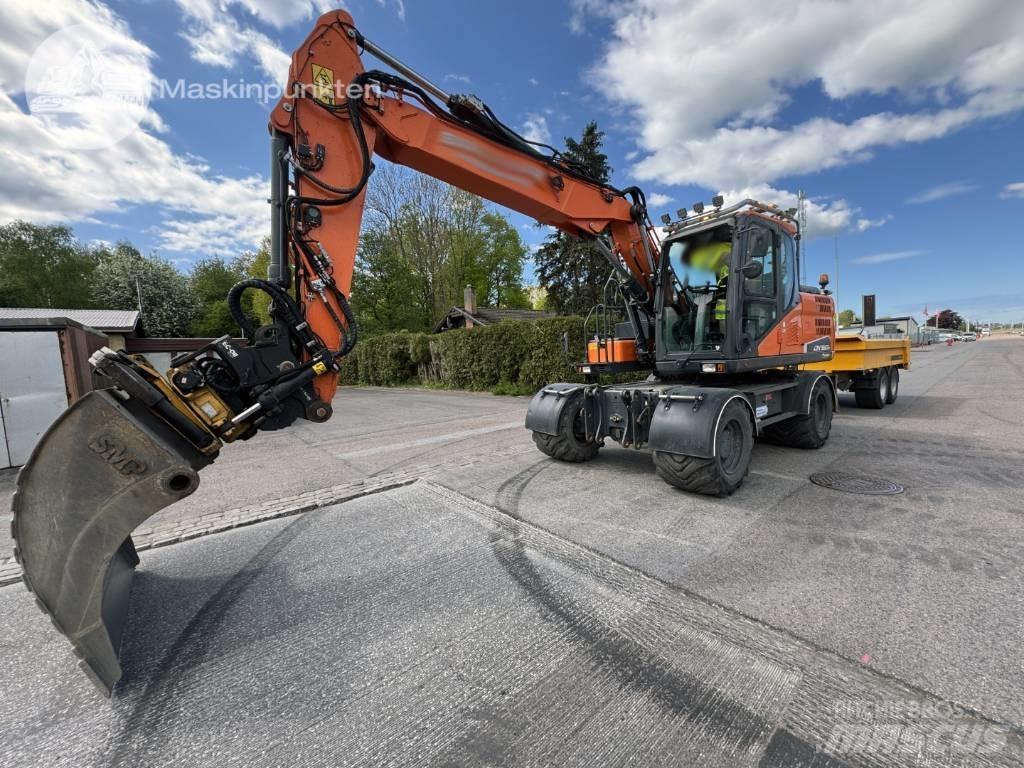 Doosan DX 160 W Pelle sur pneus