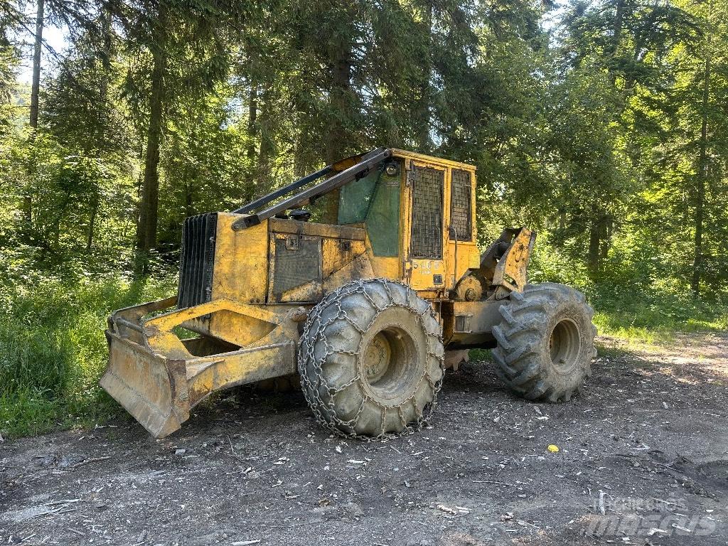 John Deere 540 E Débusqueur