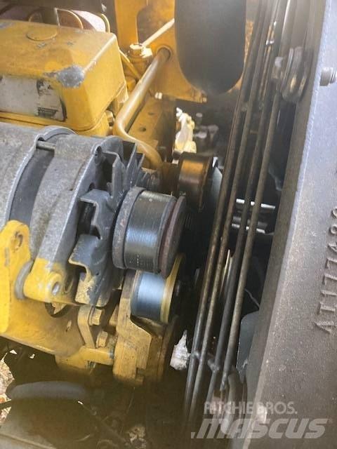 John Deere 200 LC Ebrancheuses