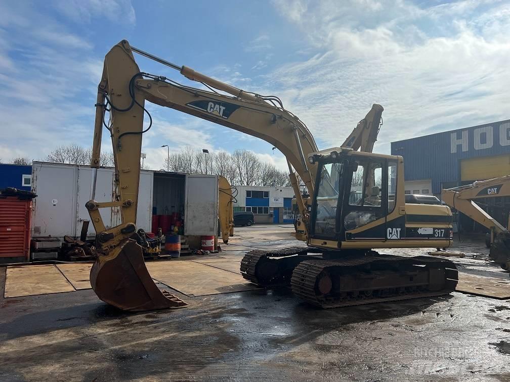 CAT 317 Pelle sur chenilles
