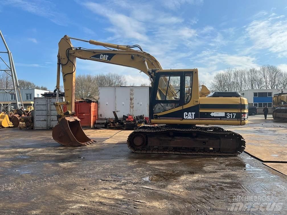 CAT 317 Pelle sur chenilles