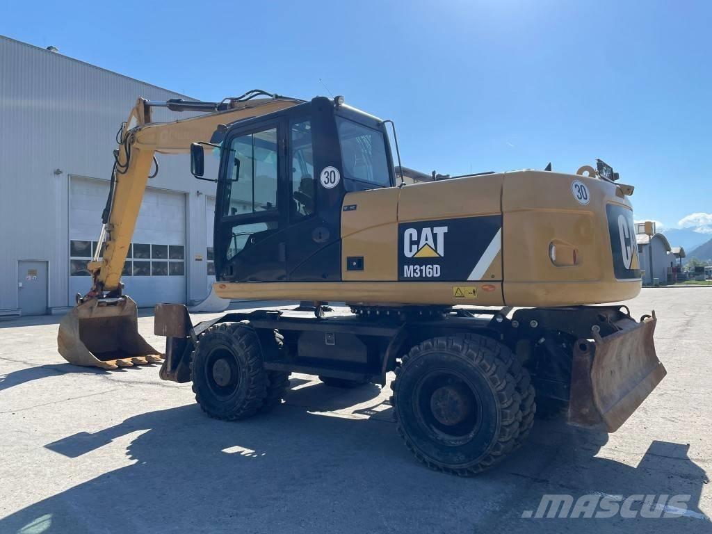 CAT M 316 D Pelle sur pneus