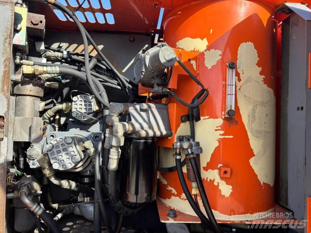 Hitachi ZX 130 W Pelle sur pneus